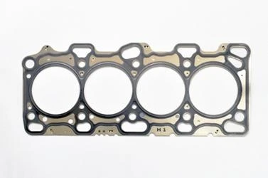 BUY OEM Mitsubishi MLS Head Gasket for Evo 9, Genuine multi-layer steel replacement gasket for the 4G63 MIVEC engine, ideal for engine repairs and rebuilds.