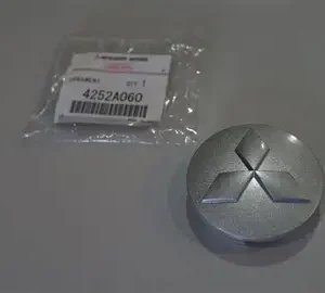 Buy Mitsubishi Evo IX/X Enkei wheel center cap 4252A060, Shop this genuine OEM replacement for compatible 2006 Evo IX and 2008–2015 Evo X wheels.
