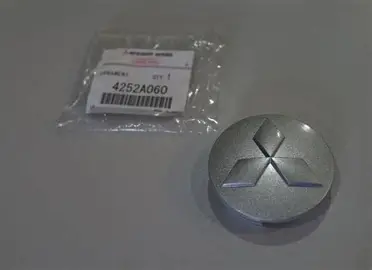 Buy Mitsubishi Evo IX/X Enkei wheel center cap 4252A060, Shop this genuine OEM replacement for compatible 2006 Evo IX and 2008–2015 Evo X wheels.