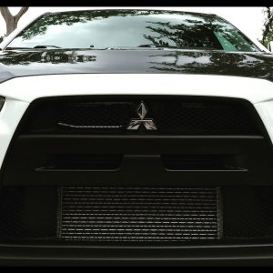 BUY Mitsubishi OEM Fog Light Bezel for Evo X, Genuine factory-style fog lamp trim for left or right front bumper replacement and restoration.