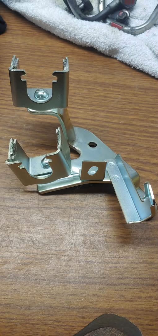Buy Mitsubishi Evo X 3265A011 shifter cable bracket for early 2008 5-speed manual models, Genuine OEM discontinued part. Shop online at Evomotorparts.