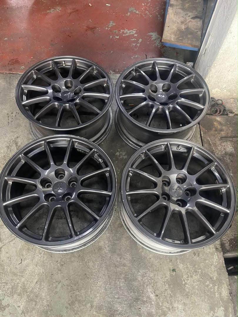 Buy Evo 9 Enkei wheels, a genuine OEM set of four 17x8J rims with a 5x114.3 bolt pattern for the Mitsubishi Lancer Evolution IX, Check fitment details.
