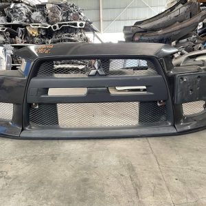 Buy Mitsubishi Evo X black front bumper in great used condition for 2008-2015 Evolution X models, Shop a quality replacement at Evomotorparts.