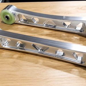 Buy Bulletproof Racing Evo 7/8/9 rear lower control arms, made from 7075 billet aluminum with installed polyurethane bushings for compatible CT9A models.