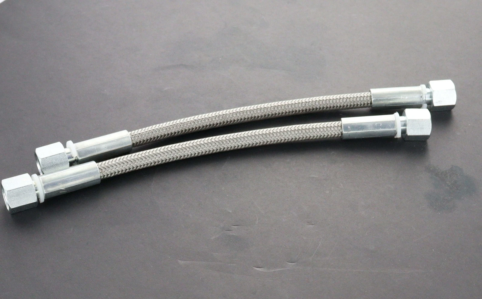 Buy Mitsubishi Evo X AYC/ACD pump replacement hoses with braided stainless steel lines and hardware, Shop Evo X drivetrain parts online.